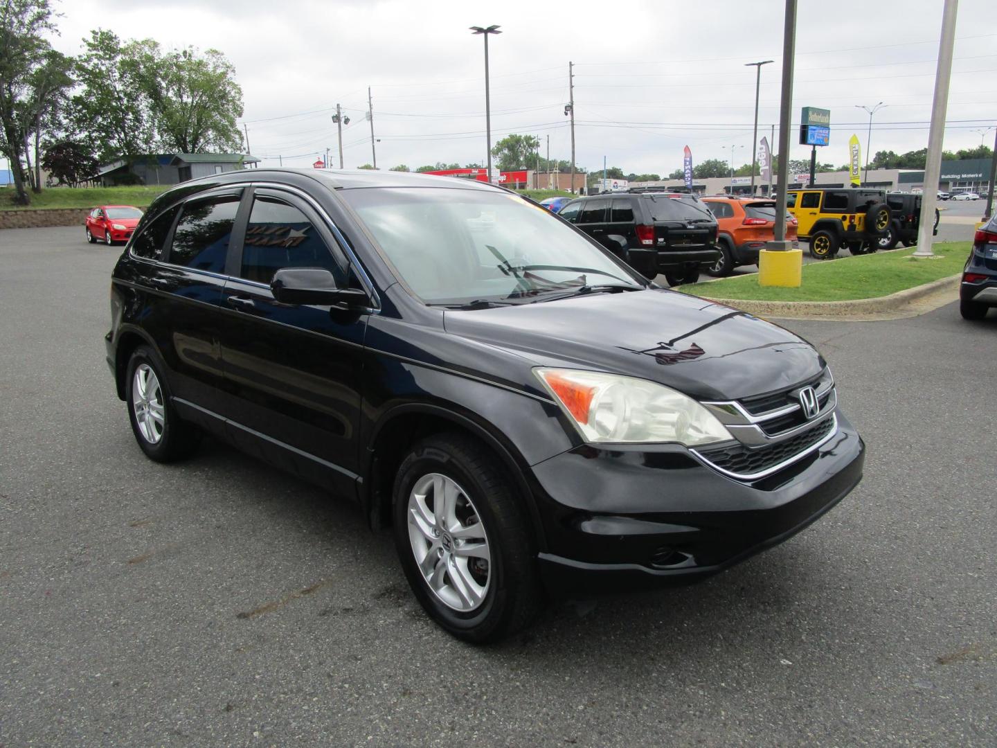 2011 BLACK /Tan / Leather Honda CR-V EX-L 4WD 5-Speed AT (5J6RE4H74BL) with an 2.4L L4 DOHC 16V engine, 5-Speed Automatic transmission, located at 1814 Albert Pike Road, Hot Springs, AR, 71913, (501) 623-1717, 34.494228, -93.094070 - Photo#3