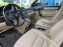 2011 BLACK /Tan / Leather Honda CR-V EX-L 4WD 5-Speed AT (5J6RE4H74BL) with an 2.4L L4 DOHC 16V engine, 5-Speed Automatic transmission, located at 1814 Albert Pike Road, Hot Springs, AR, 71913, (501) 623-1717, 34.494228, -93.094070 - Photo#6