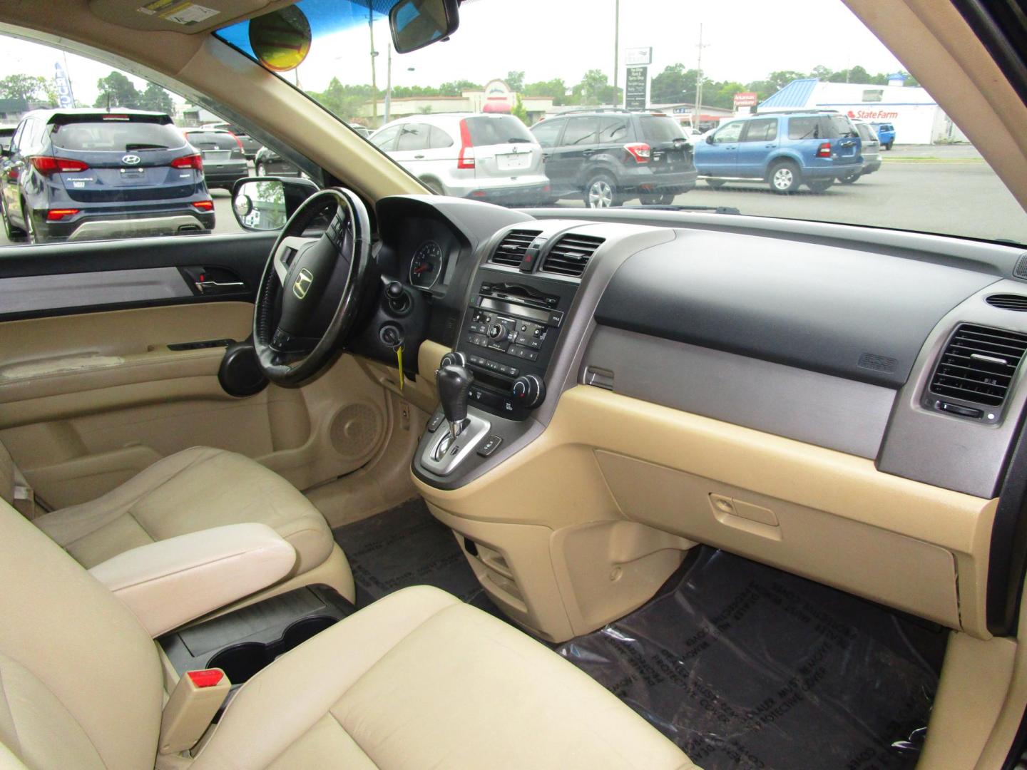 2011 BLACK /Tan / Leather Honda CR-V EX-L 4WD 5-Speed AT (5J6RE4H74BL) with an 2.4L L4 DOHC 16V engine, 5-Speed Automatic transmission, located at 1814 Albert Pike Road, Hot Springs, AR, 71913, (501) 623-1717, 34.494228, -93.094070 - Photo#9