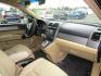 2011 BLACK /Tan / Leather Honda CR-V EX-L 4WD 5-Speed AT (5J6RE4H74BL) with an 2.4L L4 DOHC 16V engine, 5-Speed Automatic transmission, located at 1814 Albert Pike Road, Hot Springs, AR, 71913, (501) 623-1717, 34.494228, -93.094070 - Photo#9
