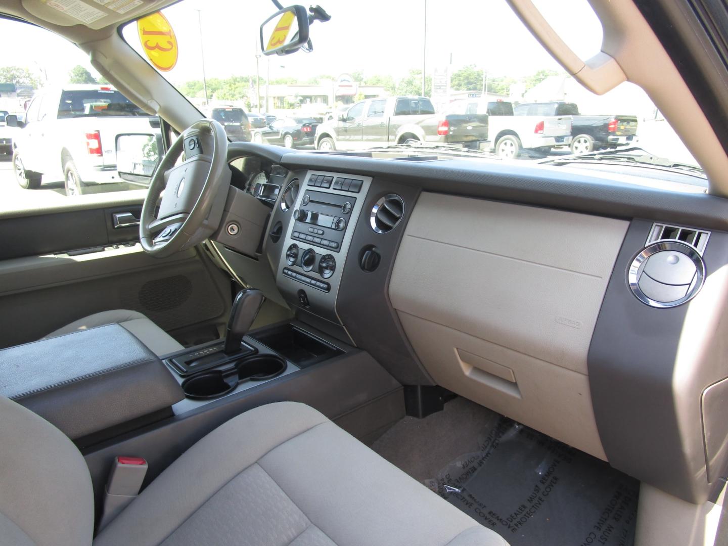 2013 Grey /Tan / Cloth Ford Expedition King Ranch 2WD (1FMJU1H50DE) with an 5.4L V8 SOHC 16V FFV engine, 6-Speed Automatic transmission, located at 1814 Albert Pike Road, Hot Springs, AR, 71913, (501) 623-1717, 34.494228, -93.094070 - 2013 Ford Expedition XLT Exterior Features: Running Boards. Luggage Rack and Crossbars. Liftgate with Flip-Up Glass. Fog Lamps. Autolamp- Auto On/Off Headlamp Interior Features: Auxiliary Audio Input Jack. Center Console with Storage. 2nd Row Bench Seat. 3rd Row Split Bench. Overhead/Floor C - Photo#4