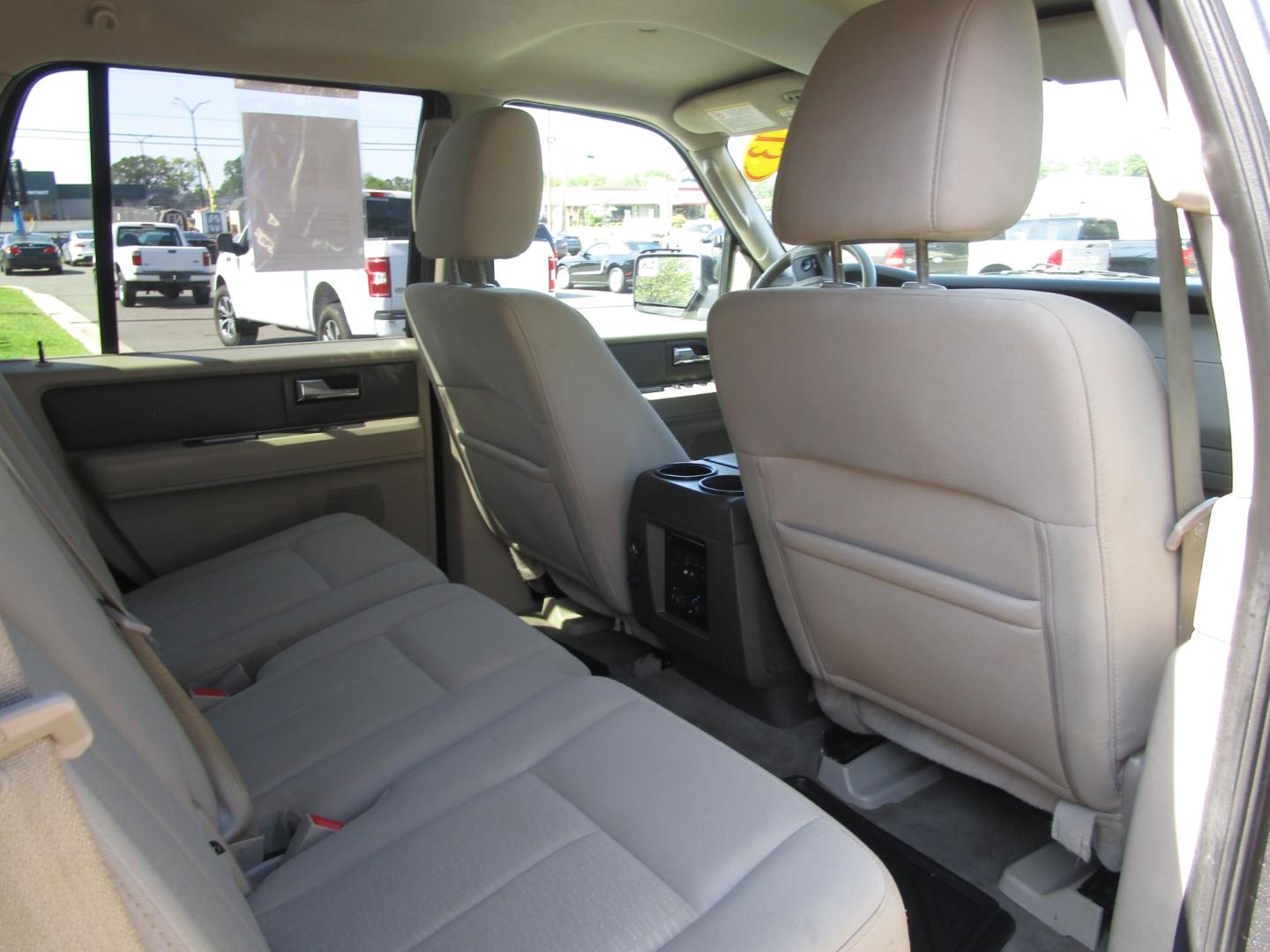 2013 Grey /Tan / Cloth Ford Expedition King Ranch 2WD (1FMJU1H50DE) with an 5.4L V8 SOHC 16V FFV engine, 6-Speed Automatic transmission, located at 1814 Albert Pike Road, Hot Springs, AR, 71913, (501) 623-1717, 34.494228, -93.094070 - 2013 Ford Expedition XLT Exterior Features: Running Boards. Luggage Rack and Crossbars. Liftgate with Flip-Up Glass. Fog Lamps. Autolamp- Auto On/Off Headlamp Interior Features: Auxiliary Audio Input Jack. Center Console with Storage. 2nd Row Bench Seat. 3rd Row Split Bench. Overhead/Floor C - Photo#5