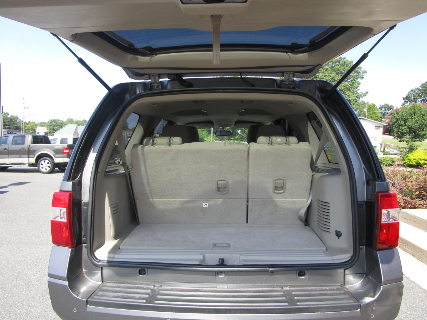2013 Grey /Tan / Cloth Ford Expedition King Ranch 2WD (1FMJU1H50DE) with an 5.4L V8 SOHC 16V FFV engine, 6-Speed Automatic transmission, located at 1814 Albert Pike Road, Hot Springs, AR, 71913, (501) 623-1717, 34.494228, -93.094070 - 2013 Ford Expedition XLT Exterior Features: Running Boards. Luggage Rack and Crossbars. Liftgate with Flip-Up Glass. Fog Lamps. Autolamp- Auto On/Off Headlamp Interior Features: Auxiliary Audio Input Jack. Center Console with Storage. 2nd Row Bench Seat. 3rd Row Split Bench. Overhead/Floor C - Photo#8