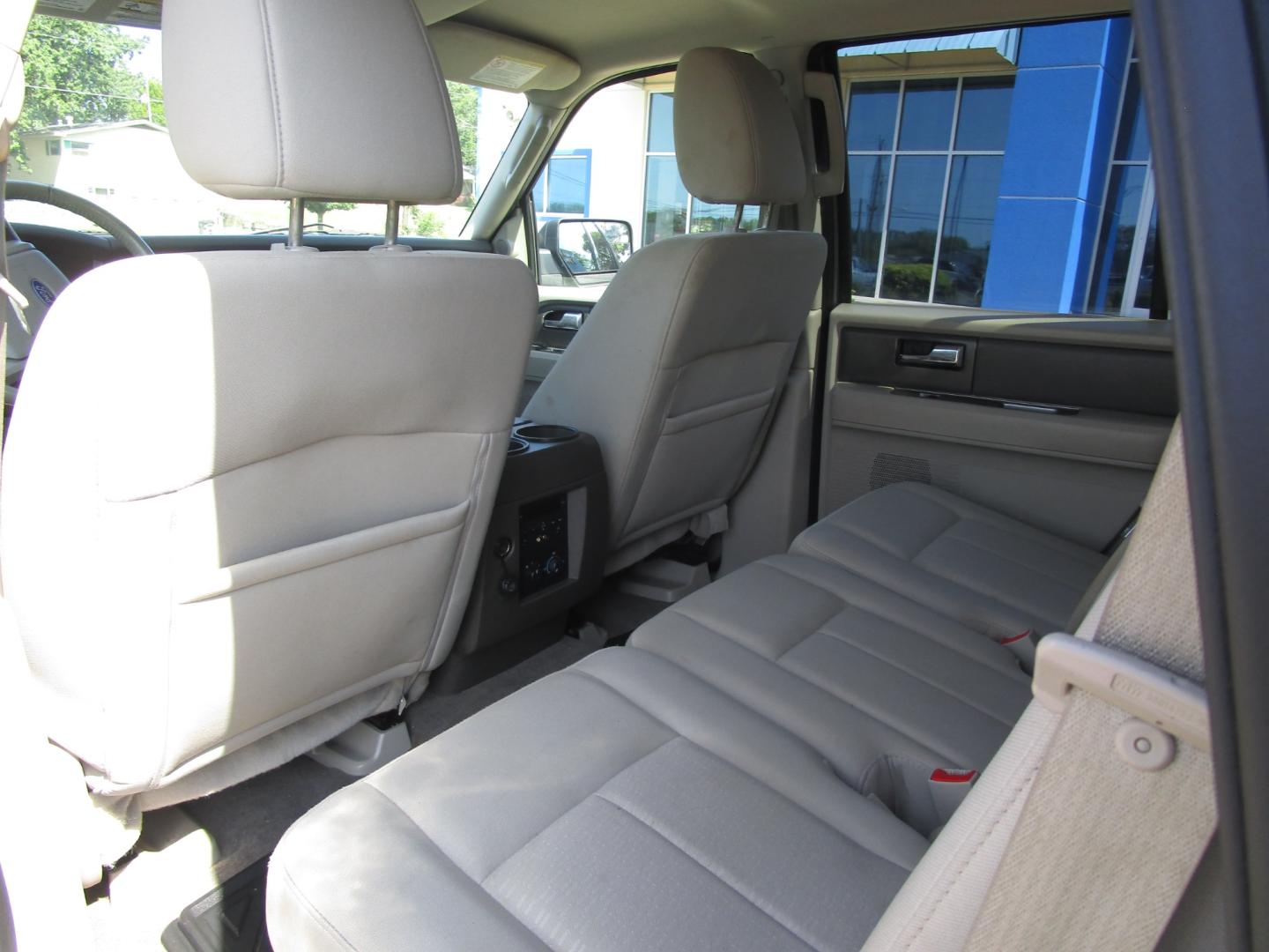2013 Grey /Tan / Cloth Ford Expedition King Ranch 2WD (1FMJU1H50DE) with an 5.4L V8 SOHC 16V FFV engine, 6-Speed Automatic transmission, located at 1814 Albert Pike Road, Hot Springs, AR, 71913, (501) 623-1717, 34.494228, -93.094070 - 2013 Ford Expedition XLT Exterior Features: Running Boards. Luggage Rack and Crossbars. Liftgate with Flip-Up Glass. Fog Lamps. Autolamp- Auto On/Off Headlamp Interior Features: Auxiliary Audio Input Jack. Center Console with Storage. 2nd Row Bench Seat. 3rd Row Split Bench. Overhead/Floor C - Photo#7