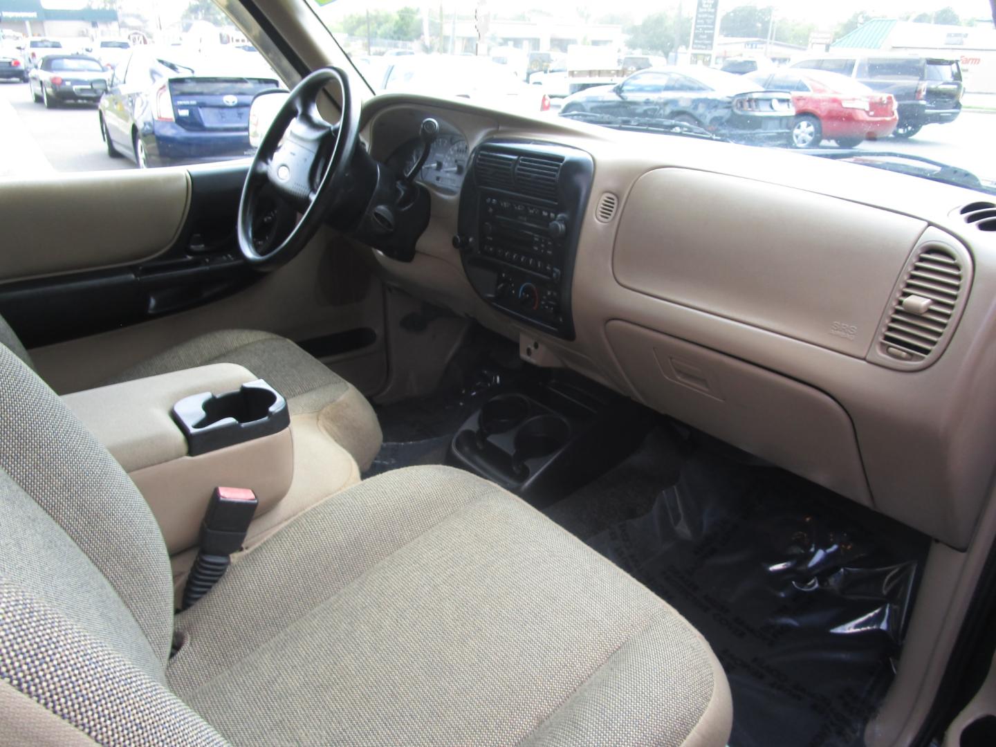 2002 BLACK /Tan / Cloth Ford Ranger XL, XLT EDGE, EDGE (1FTYR14V02P) with an 3.0L V6 OHV 12V engine, 5 SPEED AUTOMATIC transmission, located at 1814 Albert Pike Road, Hot Springs, AR, 71913, (501) 623-1717, 34.494228, -93.094070 - 2002 Ford Ranger Club Cab Pickup 3.0L V6 F Flex Fuel Rear Wheel Drive - Photo#4