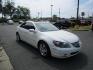 2006 WHITE /Tan / Leather Acura RL Sedan (JH4KB16566C) with an 3.5L V6 SOHC 24V engine, 5-Speed Automatic Overdrive transmission, located at 1814 Albert Pike Road, Hot Springs, AR, 71913, (501) 623-1717, 34.494228, -93.094070 - Photo#3