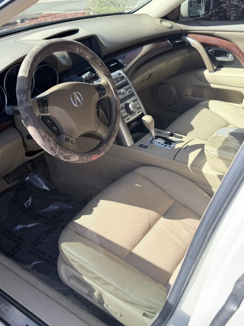 2006 WHITE /Tan / Leather Acura RL Sedan (JH4KB16566C) with an 3.5L V6 SOHC 24V engine, 5-Speed Automatic Overdrive transmission, located at 1814 Albert Pike Road, Hot Springs, AR, 71913, (501) 623-1717, 34.494228, -93.094070- Photo#3
