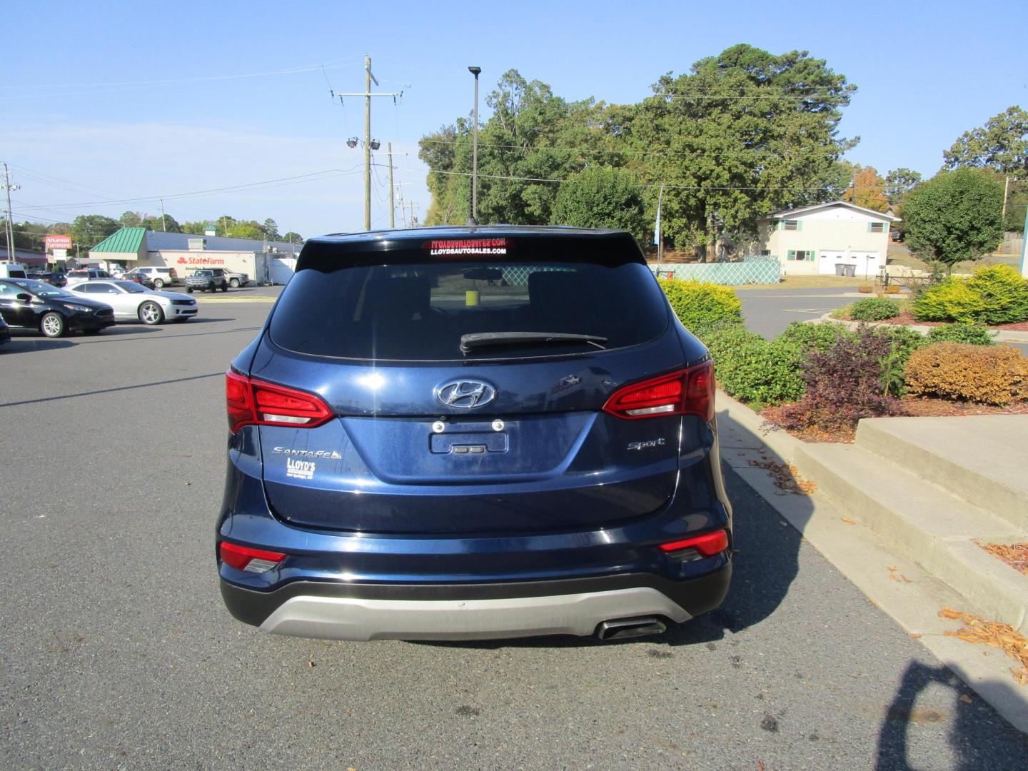 2018 Blue /TAN Hyundai Santa Fe Sport 2.4 FWD (5XYZT3LB6JG) with an 2.4L L4 DOHC 16V engine, 6A transmission, located at 1814 Albert Pike Road, Hot Springs, AR, 71913, (501) 623-1717, 34.494228, -93.094070 - 2018 Hyundai Santa Fe Sport 2.4 FWD 4 Door SUV 2.4L I4 F DOHC 16V Gasoline Front Wheel Drive - Photo#3