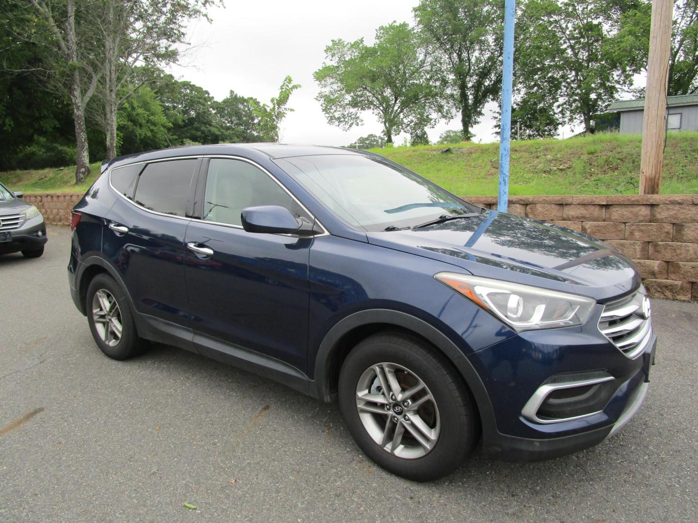 2018 Blue /TAN Hyundai Santa Fe Sport 2.4 FWD (5XYZT3LB6JG) with an 2.4L L4 DOHC 16V engine, 6A transmission, located at 1814 Albert Pike Road, Hot Springs, AR, 71913, (501) 623-1717, 34.494228, -93.094070 - 2018 Hyundai Santa Fe Sport 2.4 FWD 4 Door SUV 2.4L I4 F DOHC 16V Gasoline Front Wheel Drive - Photo#3