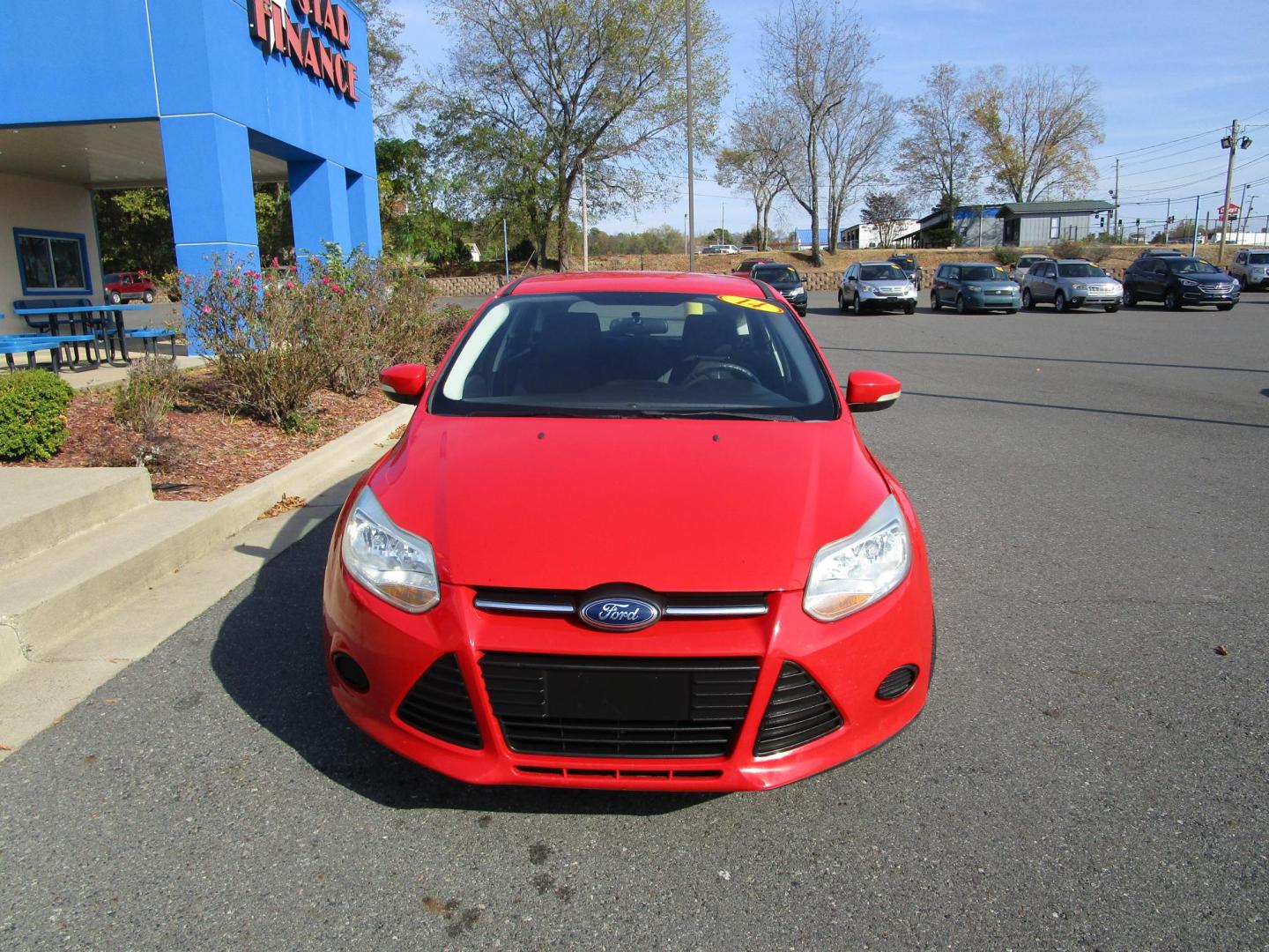 2014 RED /BLACK Ford Focus SE Hatch (1FADP3K25EL) with an 2.0L L4 DOHC 16V engine, 6-Speed Automatic transmission, located at 1814 Albert Pike Road, Hot Springs, AR, 71913, (501) 623-1717, 34.494228, -93.094070 - 2014 Ford Focus 5 door hatchback SE. 5 Passenger 2.0L I4 GDI Engine 6-Speed Automatic Transmission Exterior Features: Auto Halogen Headlamps. Easy Fuel Capless Filler. Manual Fold/Power Integrated Spotter Mirrors. Rear Spoiler. Rear Wiper. Interior Features: Bucket Seats. A/C. Center Console - Photo#1