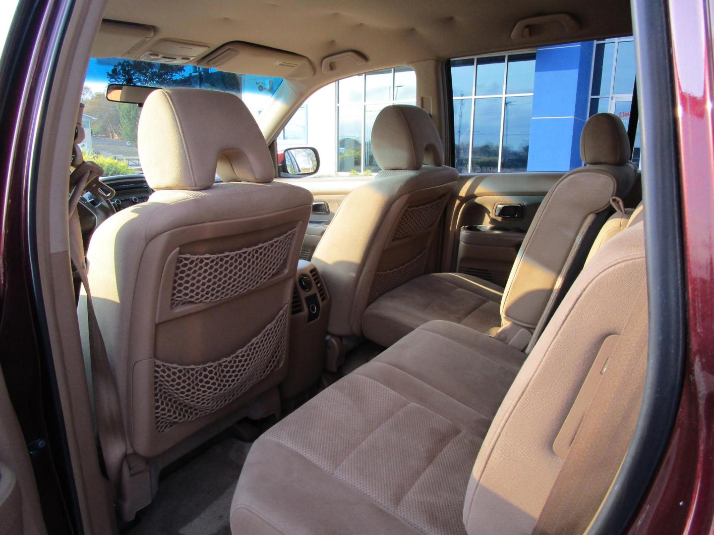 2008 Dark Cherry Pearl /Saddle Honda Pilot EX 2WD (5FNYF28408B) with an 3.5L V6 SOHC 24V engine, 5-Speed Automatic Overdrive transmission, located at 1814 Albert Pike Road, Hot Springs, AR, 71913, (501) 623-1717, 34.494228, -93.094070 - 2008 Honda Pilot EX 4 Door SUV. 3.5L V6 F SOHC 24V Gasoline. Front Wheel Drive. 3rd Row Seating. - Photo#7