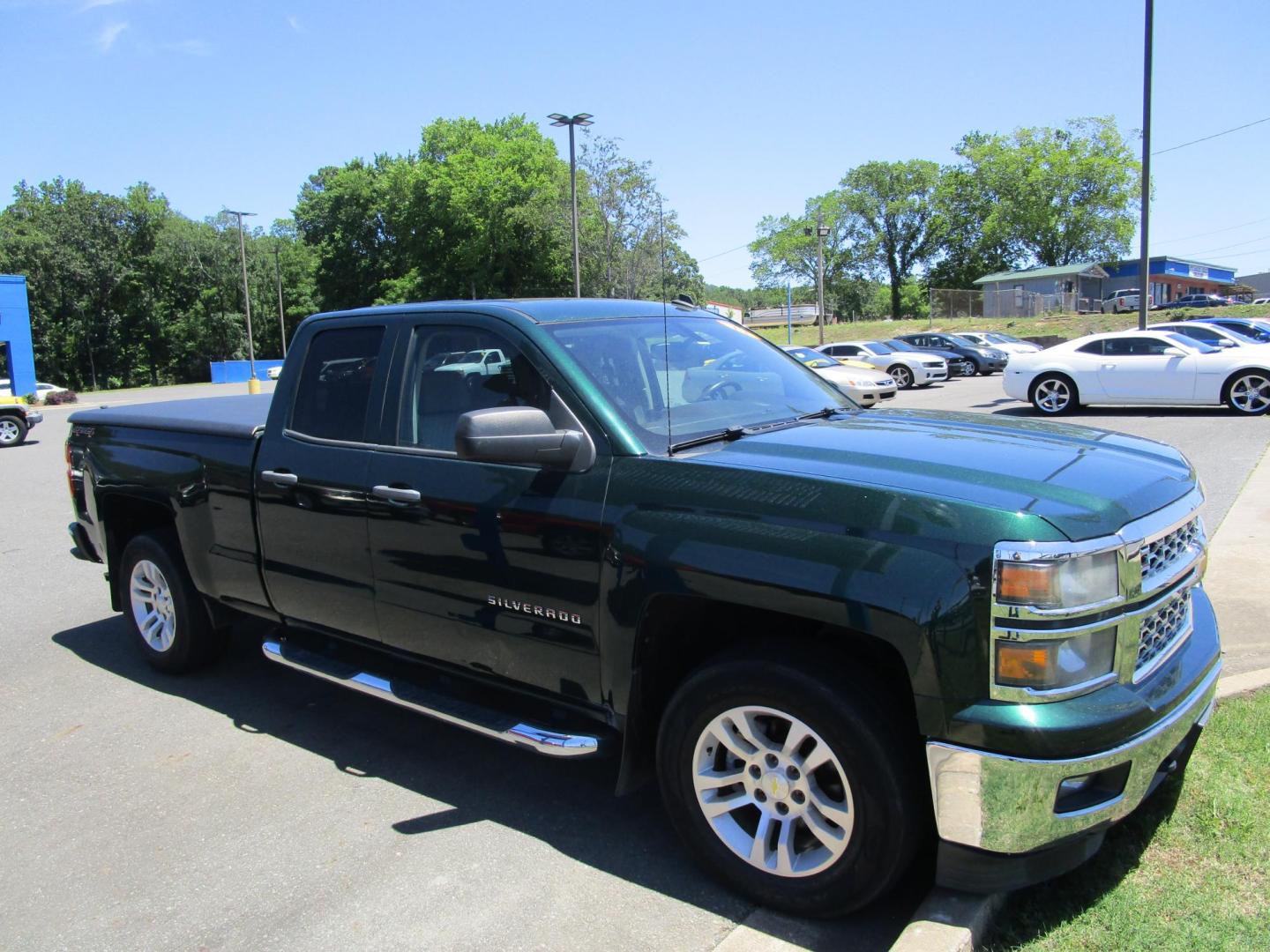 2014 Green /Tan / Cloth Chevrolet Silverado 1500 1LT Double Cab 4WD (1GCVKREC1EZ) with an 5.3L V8 OHV 16V engine, 6-Speed Automatic transmission, located at 1814 Albert Pike Road, Hot Springs, AR, 71913, (501) 623-1717, 34.494228, -93.094070 - Photo#3