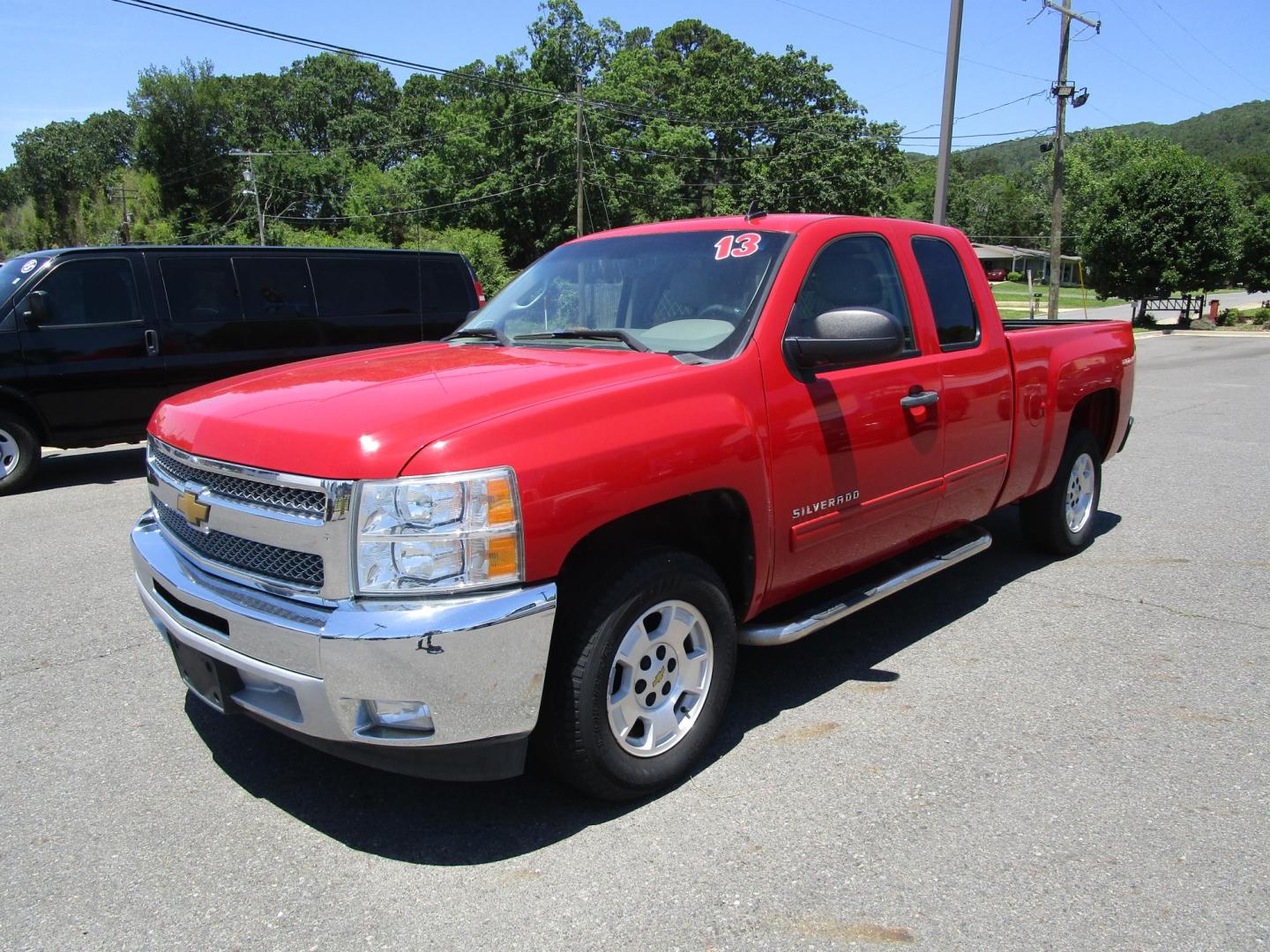 2013 RED /Tan / Cloth Chevrolet Silverado 1500 LT Ext. Cab 2WD (1GCRCSE00DZ) with an 5.3L V8 OHV 16V FFV engine, located at 1814 Albert Pike Road, Hot Springs, AR, 71913, (501) 623-1717, 34.494228, -93.094070 - Photo#1
