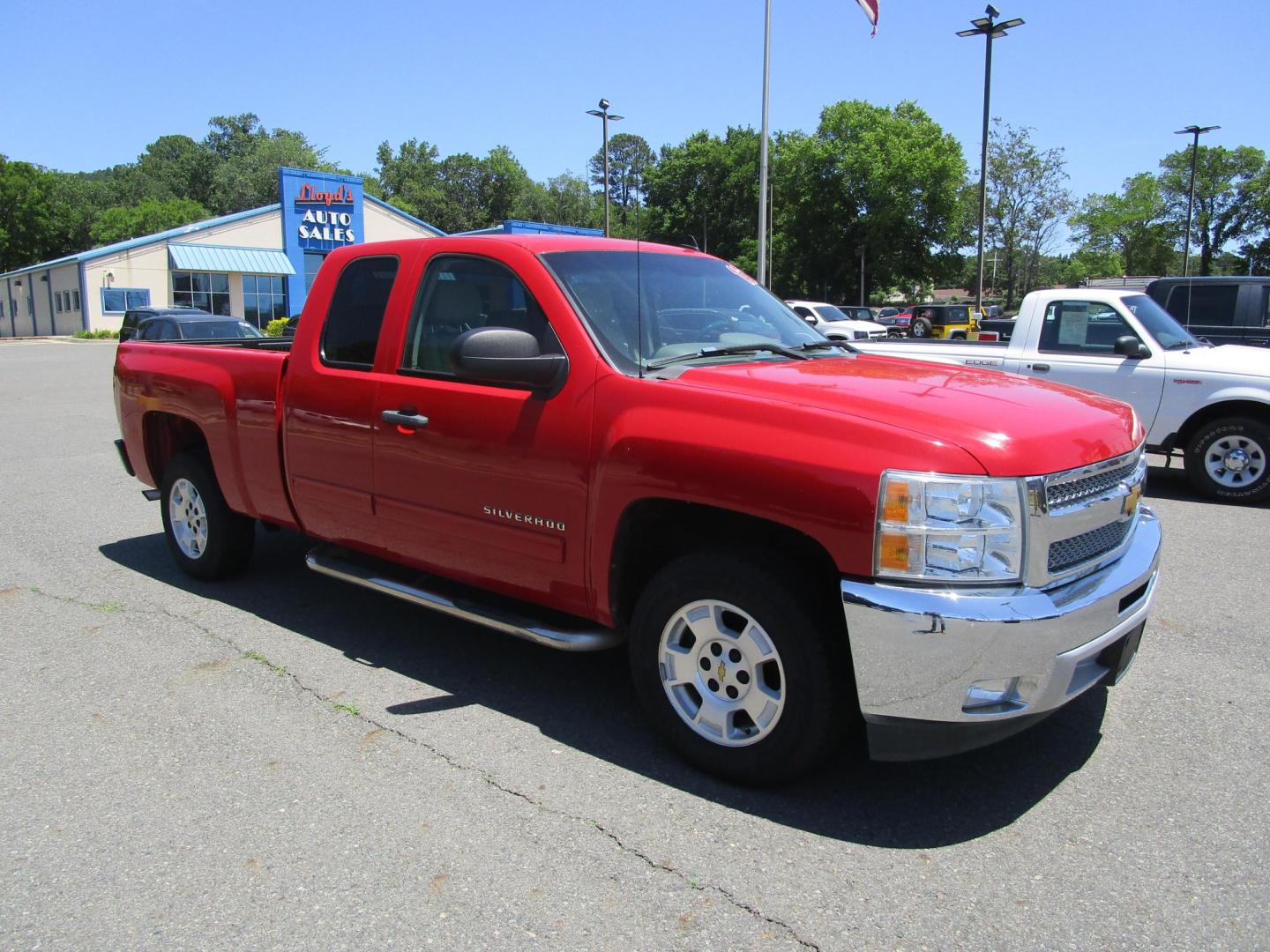 2013 RED /Tan / Cloth Chevrolet Silverado 1500 LT Ext. Cab 2WD (1GCRCSE00DZ) with an 5.3L V8 OHV 16V FFV engine, located at 1814 Albert Pike Road, Hot Springs, AR, 71913, (501) 623-1717, 34.494228, -93.094070 - Photo#3