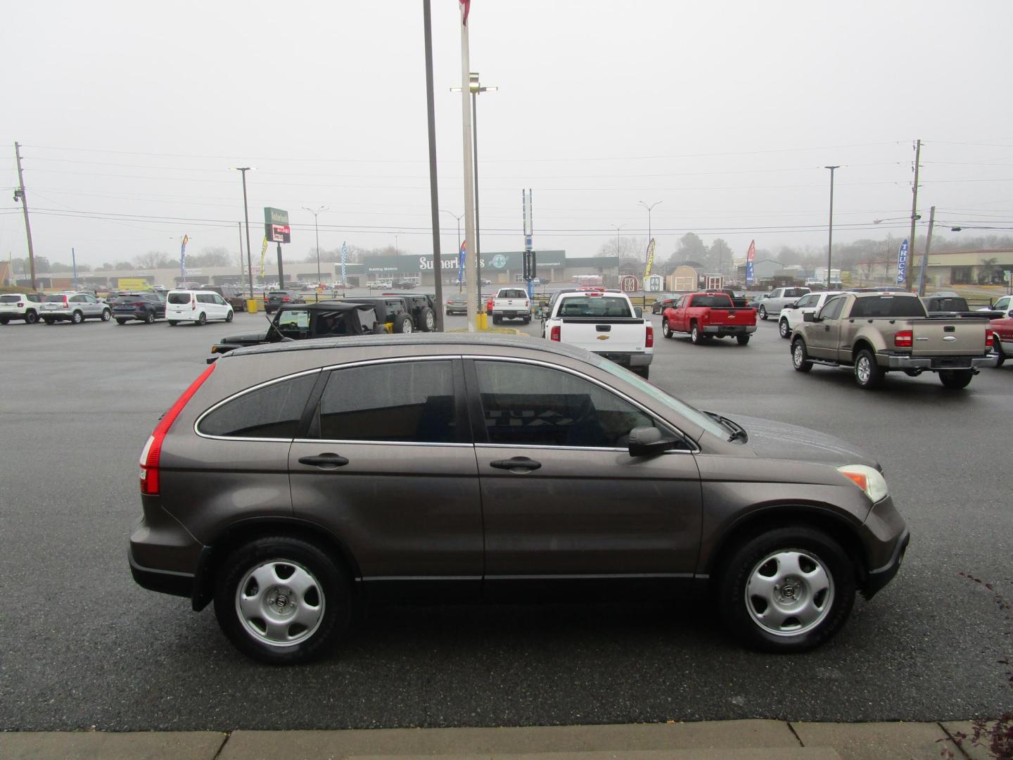 2009 BEIGE /BLACK Honda CR-V LX 2WD 5-Speed AT (3CZRE38399G) with an 2.4L L4 DOHC 16V engine, 5-Speed Automatic transmission, located at 1814 Albert Pike Road, Hot Springs, AR, 71913, (501) 623-1717, 34.494228, -93.094070 - Photo#2