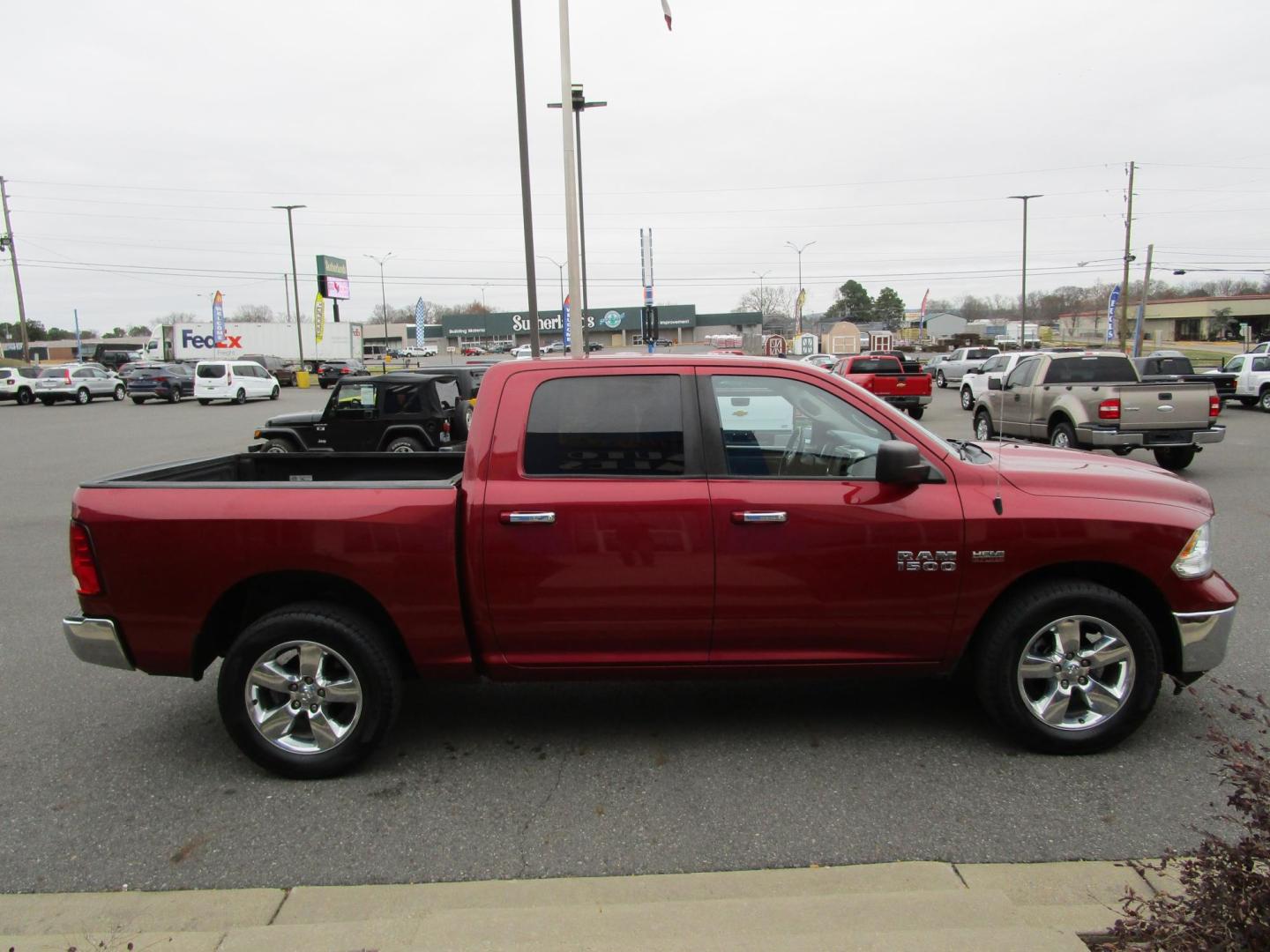 2015 RED /GREY RAM 1500 SLT Crew Cab SWB 4WD (3C6RR7LT4FG) with an 5.7L V8 OHV 16V engine, 6-Speed Automatic transmission, located at 1814 Albert Pike Road, Hot Springs, AR, 71913, (501) 623-1717, 34.494228, -93.094070 - Photo#2