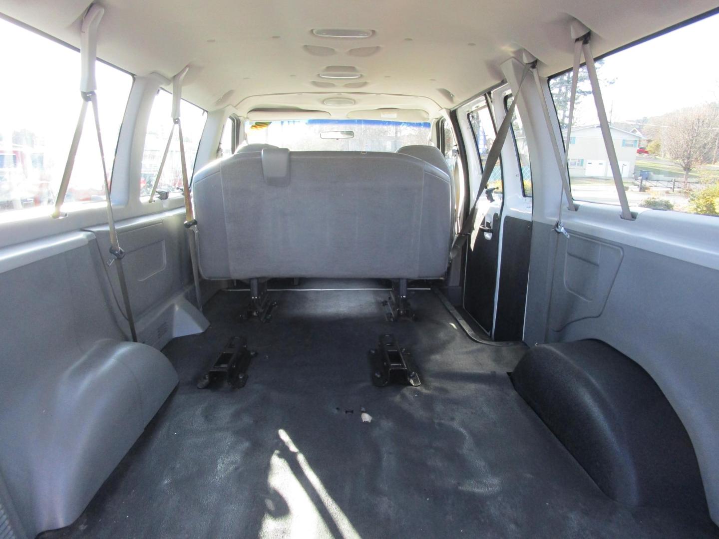 2008 WHITE /GREY Ford E-Series Wagon E-150 XL (1FMNE11W88D) with an 4.6L V8 SOHC 16V engine, 4-Speed Automatic transmission, located at 1814 Albert Pike Road, Hot Springs, AR, 71913, (501) 623-1717, 34.494228, -93.094070 - Photo#9