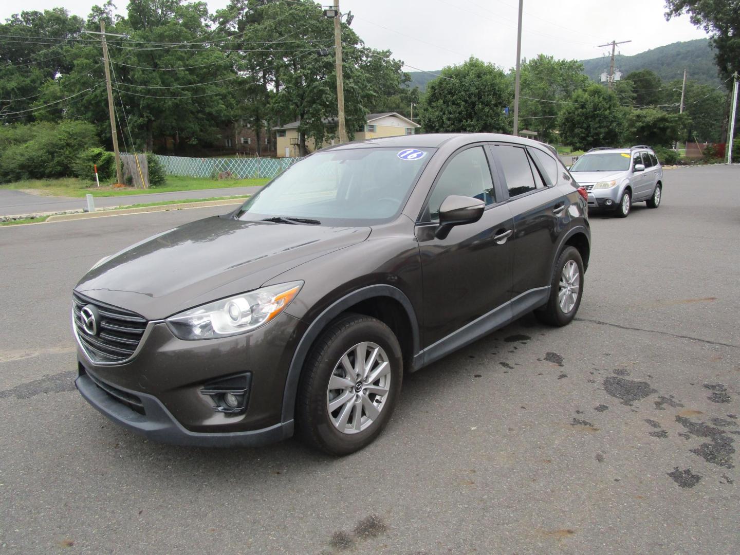 2016 Grey /BLACK Mazda CX-5 Touring AWD (JM3KE4CY2G0) with an 2.5L L4 DOHC 16V engine, 6-Speed Automatic transmission, located at 1814 Albert Pike Road, Hot Springs, AR, 71913, (501) 623-1717, 34.494228, -93.094070 - Photo#1