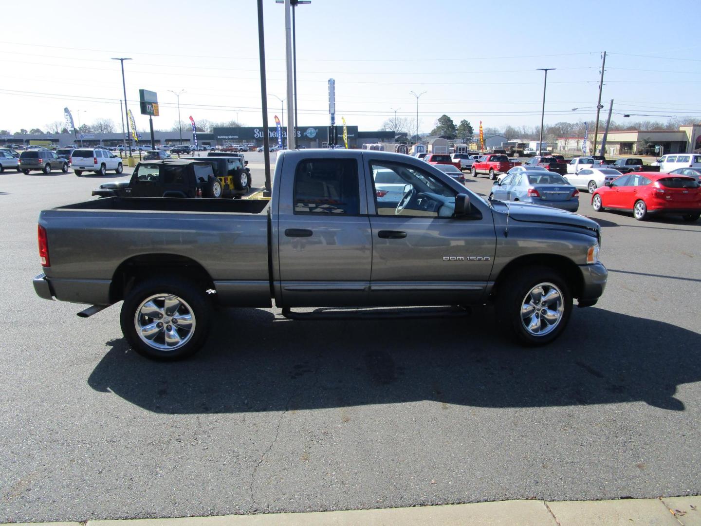 2005 Grey /BLACK Dodge Ram 1500 Laramie Quad Cab Long Bed 4WD (1D7HU18N85S) with an 4.7L V8 SOHC 16V engine, 5-Speed Automatic Overdrive transmission, located at 1814 Albert Pike Road, Hot Springs, AR, 71913, (501) 623-1717, 34.494228, -93.094070 - Photo#2