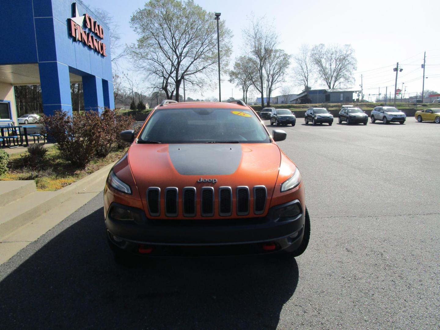 2015 Orange /BLACK Jeep Cherokee Trailhawk 4WD (1C4PJMBS9FW) with an 3.2L V6 DOHC 24V engine, 9-Speed Automatic transmission, located at 1814 Albert Pike Road, Hot Springs, AR, 71913, (501) 623-1717, 34.494228, -93.094070 - Photo#1