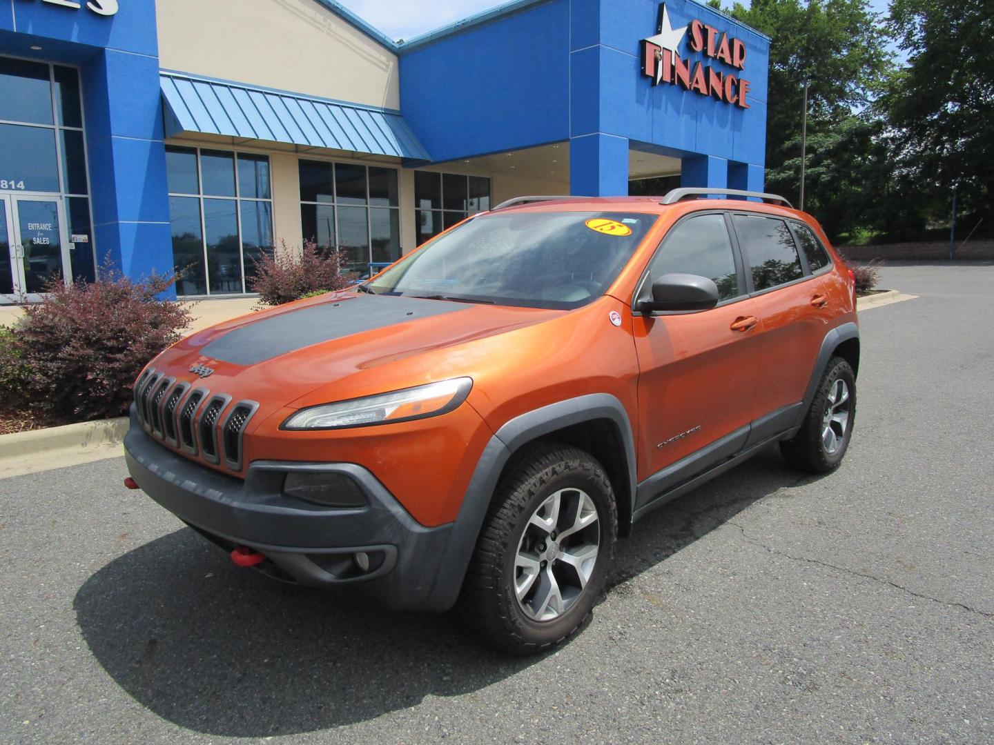 2015 Orange /BLACK Jeep Cherokee Trailhawk 4WD (1C4PJMBS9FW) with an 3.2L V6 DOHC 24V engine, 9-Speed Automatic transmission, located at 1814 Albert Pike Road, Hot Springs, AR, 71913, (501) 623-1717, 34.494228, -93.094070 - Photo#1
