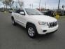 2011 WHITE /Tan / Cloth Jeep Grand Cherokee Laredo 2WD (1J4RS4GG6BC) with an 3.6L V6 DOHC 24V engine, 5-Speed Automatic transmission, located at 1814 Albert Pike Road, Hot Springs, AR, 71913, (501) 623-1717, 34.494228, -93.094070 - Photo#4