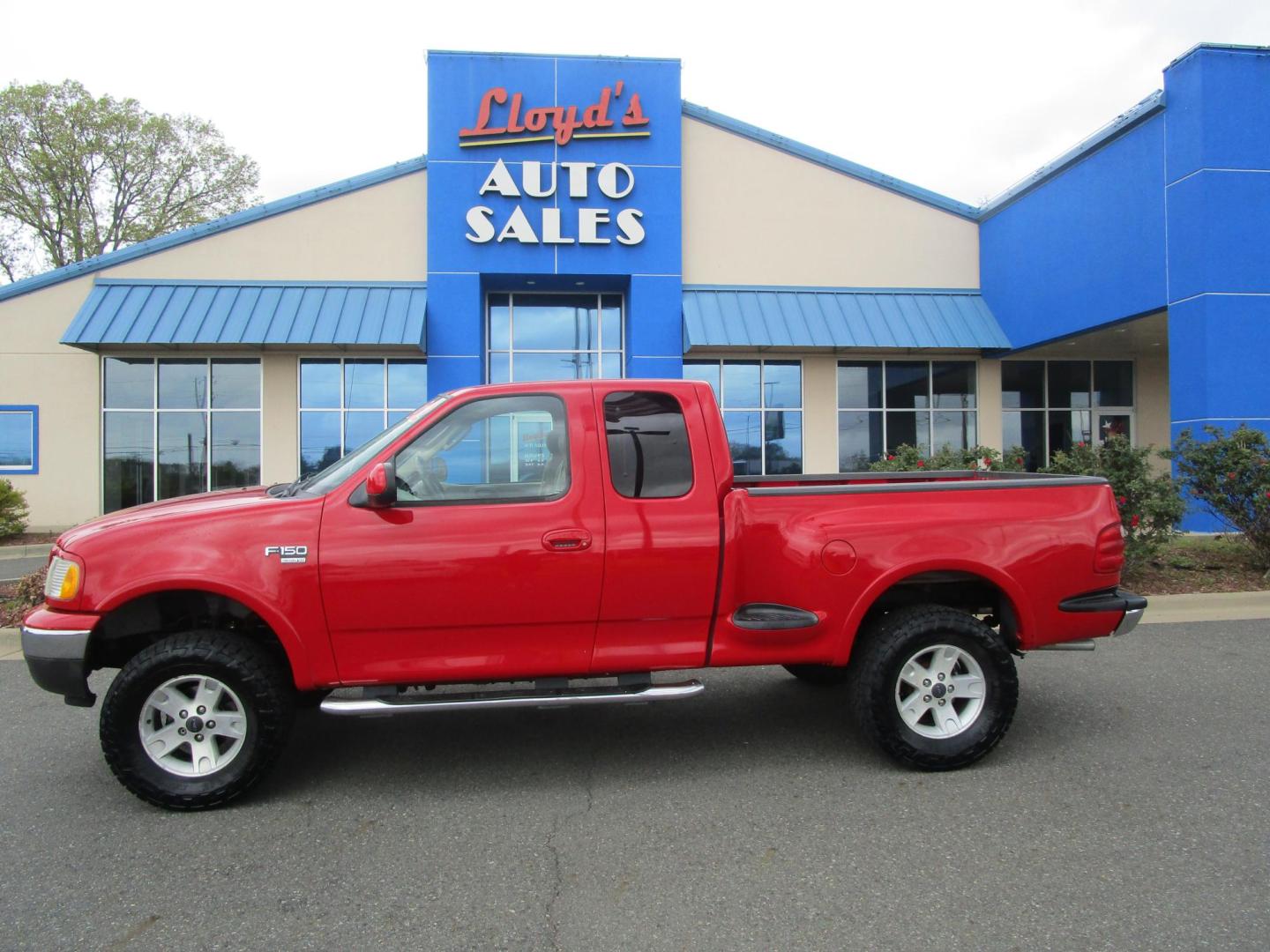 2002 RED /Tan / Leather Ford F-150 Lariat SuperCab Flareside 4WD (2FTRX08L42C) with an 5.4L V8 SOHC 16V engine, 4-Speed Automatic Overdrive transmission, located at 1814 Albert Pike Road, Hot Springs, AR, 71913, (501) 623-1717, 34.494228, -93.094070 - Photo#0