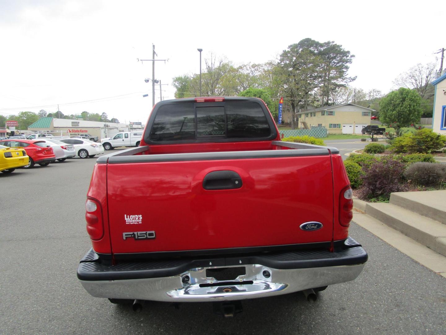 2002 RED /Tan / Leather Ford F-150 Lariat SuperCab Flareside 4WD (2FTRX08L42C) with an 5.4L V8 SOHC 16V engine, 4-Speed Automatic Overdrive transmission, located at 1814 Albert Pike Road, Hot Springs, AR, 71913, (501) 623-1717, 34.494228, -93.094070 - Photo#5