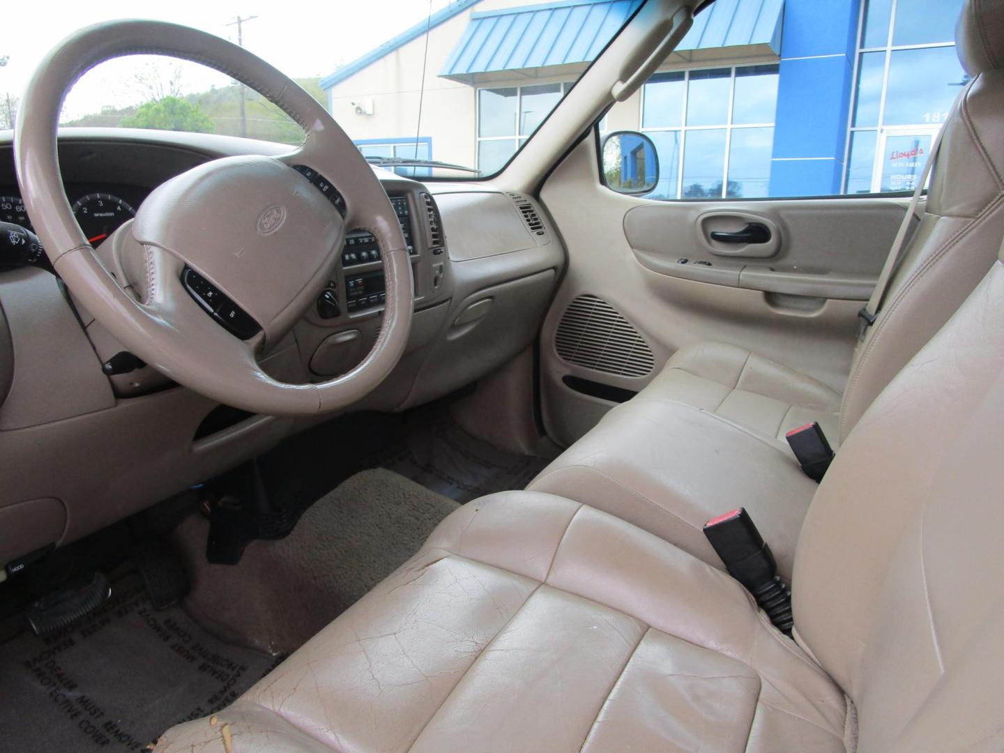 2002 RED /Tan / Leather Ford F-150 Lariat SuperCab Flareside 4WD (2FTRX08L42C) with an 5.4L V8 SOHC 16V engine, 4-Speed Automatic Overdrive transmission, located at 1814 Albert Pike Road, Hot Springs, AR, 71913, (501) 623-1717, 34.494228, -93.094070 - Photo#6