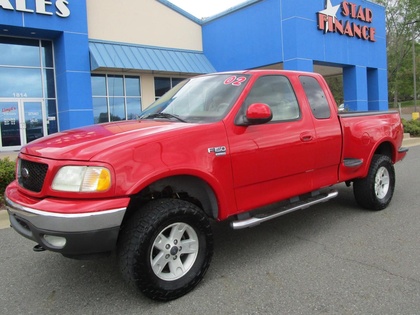 2002 RED /Tan / Leather Ford F-150 Lariat SuperCab Flareside 4WD (2FTRX08L42C) with an 5.4L V8 SOHC 16V engine, 4-Speed Automatic Overdrive transmission, located at 1814 Albert Pike Road, Hot Springs, AR, 71913, (501) 623-1717, 34.494228, -93.094070 - Photo#1
