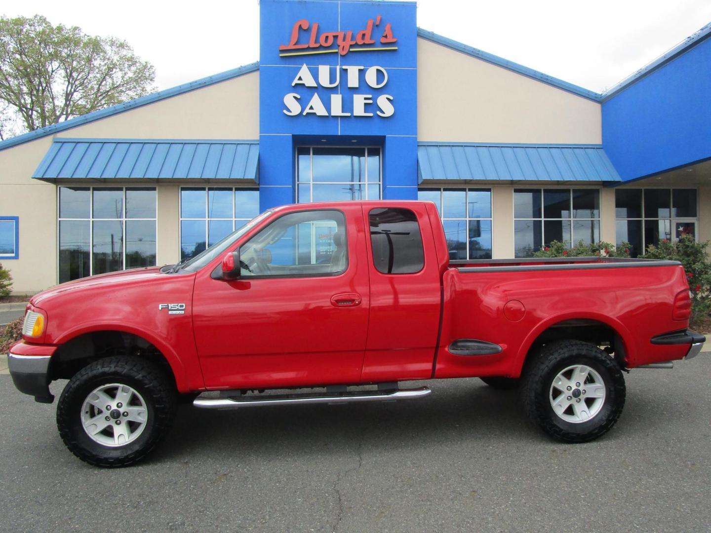 2002 RED /Tan / Leather Ford F-150 Lariat SuperCab Flareside 4WD (2FTRX08L42C) with an 5.4L V8 SOHC 16V engine, 4-Speed Automatic Overdrive transmission, located at 1814 Albert Pike Road, Hot Springs, AR, 71913, (501) 623-1717, 34.494228, -93.094070 - Photo#0
