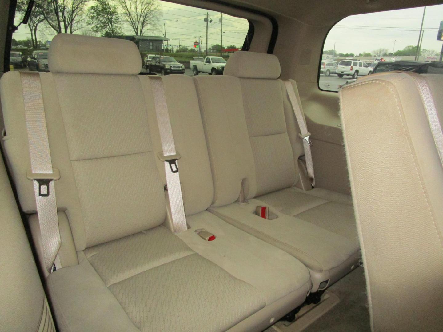 2009 GOLD /Tan Chevrolet Tahoe LT1 2WD (1GNEC23359R) with an 5.3L V8 OHV 16V FFV engine, 6-Speed Automatic transmission, located at 1814 Albert Pike Road, Hot Springs, AR, 71913, (501) 623-1717, 34.494228, -93.094070 - Photo#9