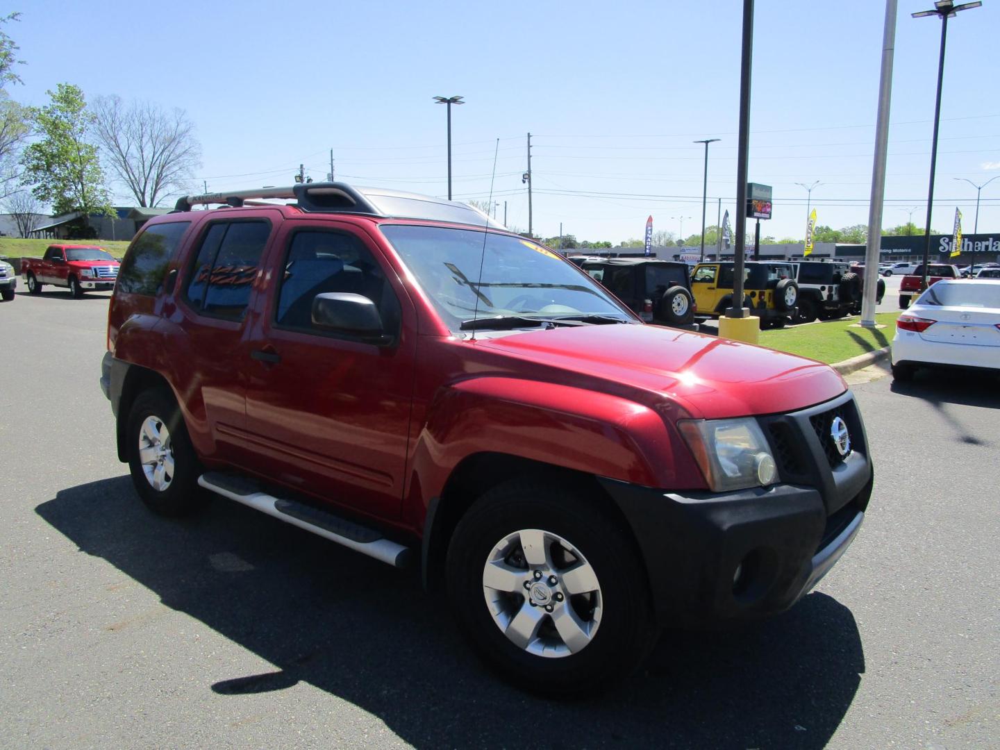 2010 RED /BLACK Nissan Xterra S 2WD (5N1AN0NU0AC) with an 4.0L V6 DOHC 24V engine, located at 1814 Albert Pike Road, Hot Springs, AR, 71913, (501) 623-1717, 34.494228, -93.094070 - Photo#3