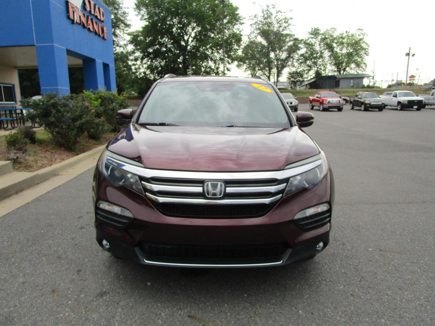 2017 MAROON /Tan / Leather Honda Pilot Touring (5FNYF6H95HB) with an 3.5L V6 SOHC 24V engine, 9A transmission, located at 1814 Albert Pike Road, Hot Springs, AR, 71913, (501) 623-1717, 34.494228, -93.094070 - Photo#2