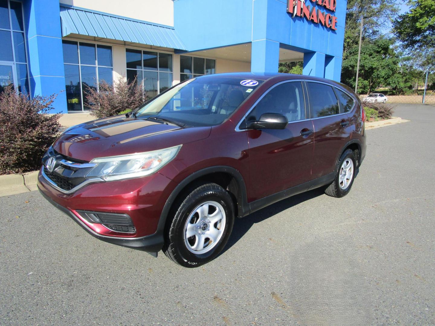 2015 RED Honda CR-V LX 4WD (2HKRM4H38FH) with an 2.4L L4 DOHC 16V engine, Continuously Variable Transmission transmission, located at 1814 Albert Pike Road, Hot Springs, AR, 71913, (501) 623-1717, 34.494228, -93.094070 - Photo#1
