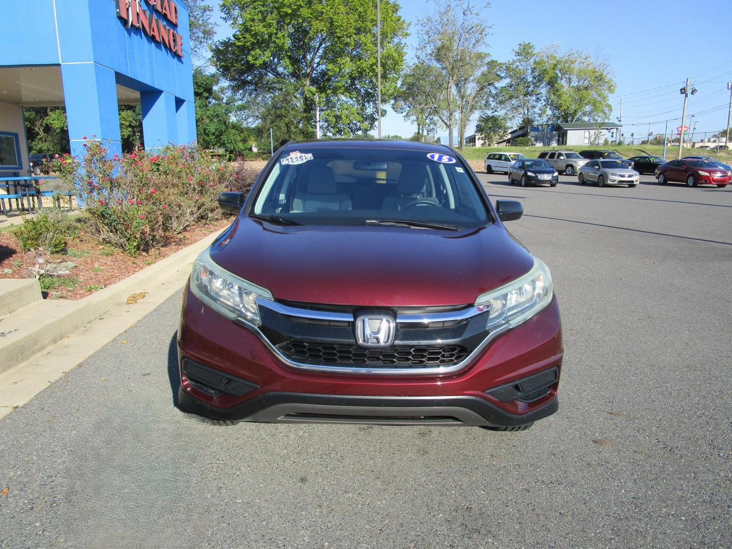 2015 RED Honda CR-V LX 4WD (2HKRM4H38FH) with an 2.4L L4 DOHC 16V engine, Continuously Variable Transmission transmission, located at 1814 Albert Pike Road, Hot Springs, AR, 71913, (501) 623-1717, 34.494228, -93.094070 - Photo#2