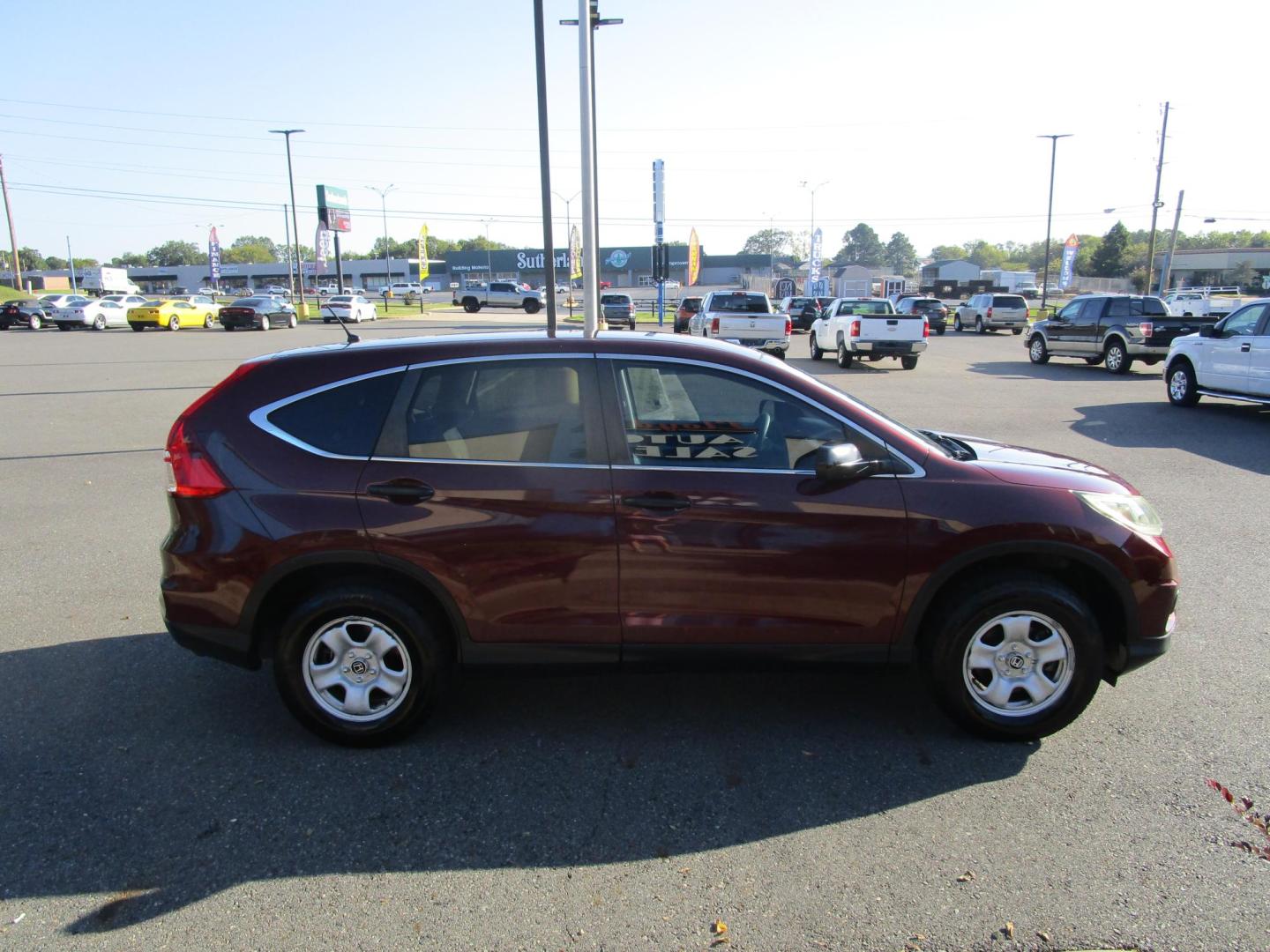 2015 RED Honda CR-V LX 4WD (2HKRM4H38FH) with an 2.4L L4 DOHC 16V engine, Continuously Variable Transmission transmission, located at 1814 Albert Pike Road, Hot Springs, AR, 71913, (501) 623-1717, 34.494228, -93.094070 - Photo#4