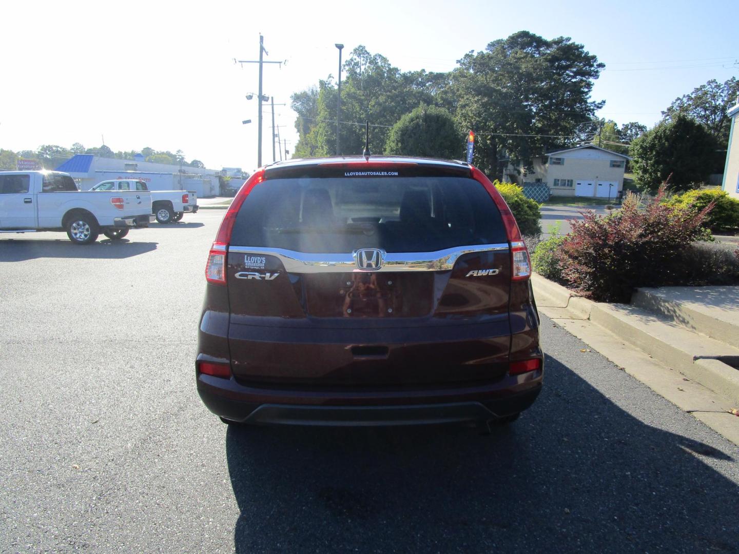 2015 RED Honda CR-V LX 4WD (2HKRM4H38FH) with an 2.4L L4 DOHC 16V engine, Continuously Variable Transmission transmission, located at 1814 Albert Pike Road, Hot Springs, AR, 71913, (501) 623-1717, 34.494228, -93.094070 - Photo#5