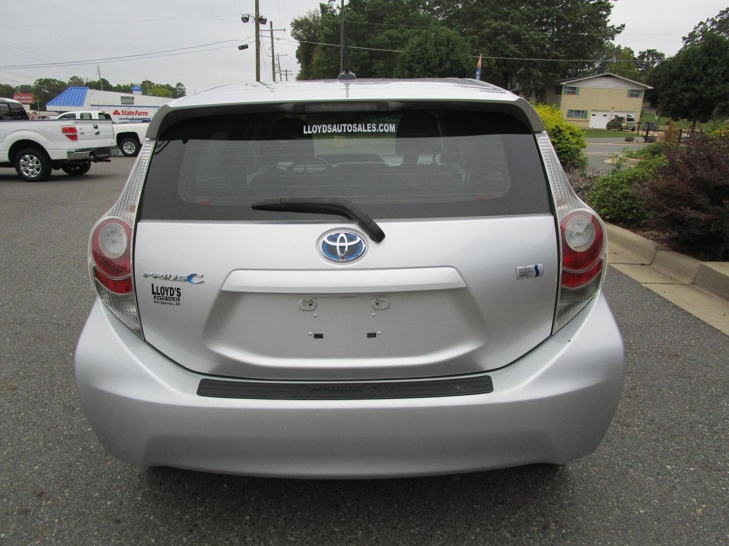 2012 SILVER Toyota Prius c One (JTDKDTB39C1) with an 1.5L L4 DOHC 16V HYBRID engine, Continuously Variable Transmission transmission, located at 1814 Albert Pike Road, Hot Springs, AR, 71913, (501) 623-1717, 34.494228, -93.094070 - Photo#5