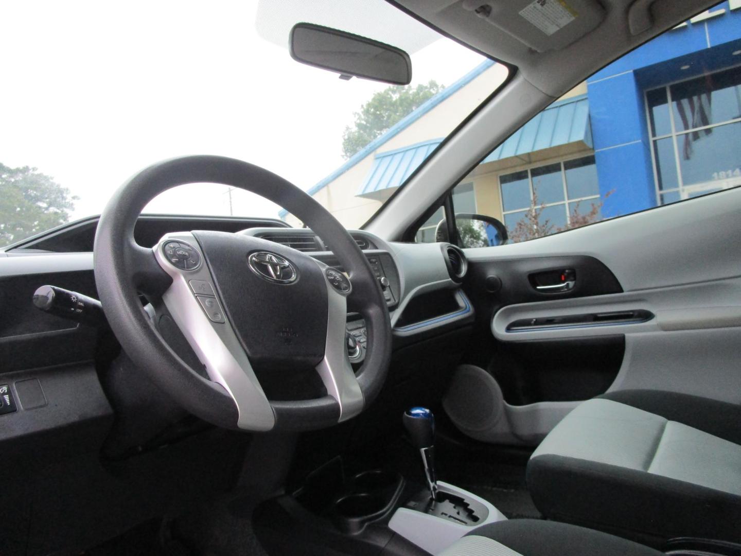 2012 SILVER Toyota Prius c One (JTDKDTB39C1) with an 1.5L L4 DOHC 16V HYBRID engine, Continuously Variable Transmission transmission, located at 1814 Albert Pike Road, Hot Springs, AR, 71913, (501) 623-1717, 34.494228, -93.094070 - Photo#6