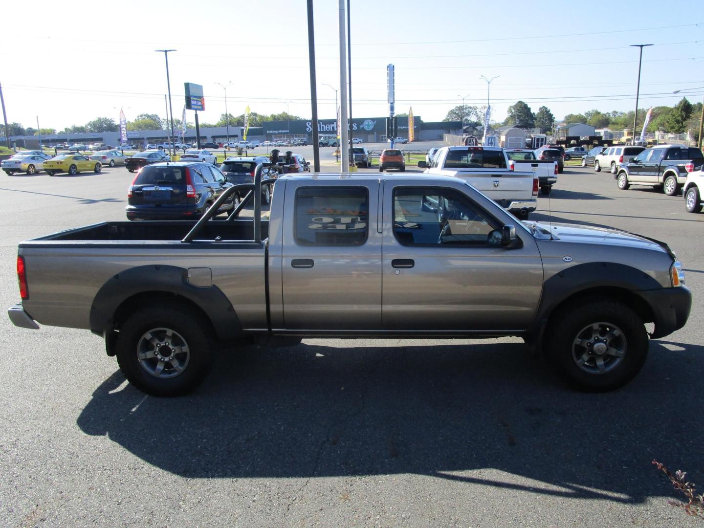 2003 Grey Nissan Frontier SE-V6 Crew Cab Long Bed 2WD (1N6ED29X63C) with an 3.3L V6 SOHC 12V engine, located at 1814 Albert Pike Road, Hot Springs, AR, 71913, (501) 623-1717, 34.494228, -93.094070 - Photo#4
