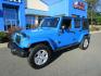 2011 Blue /Black/Cloth Jeep Wrangler Unlimited Sahara 4WD (1J4BA5H10BL) with an 3.8L V6 OHV 12V engine, located at 1814 Albert Pike Road, Hot Springs, AR, 71913, (501) 623-1717, 34.494228, -93.094070 - Photo#1
