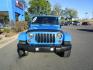 2011 Blue /Black/Cloth Jeep Wrangler Unlimited Sahara 4WD (1J4BA5H10BL) with an 3.8L V6 OHV 12V engine, located at 1814 Albert Pike Road, Hot Springs, AR, 71913, (501) 623-1717, 34.494228, -93.094070 - Photo#2