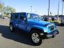 2011 Blue /Black/Cloth Jeep Wrangler Unlimited Sahara 4WD (1J4BA5H10BL) with an 3.8L V6 OHV 12V engine, located at 1814 Albert Pike Road, Hot Springs, AR, 71913, (501) 623-1717, 34.494228, -93.094070 - Photo#3