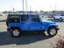 2011 Blue /Black/Cloth Jeep Wrangler Unlimited Sahara 4WD (1J4BA5H10BL) with an 3.8L V6 OHV 12V engine, located at 1814 Albert Pike Road, Hot Springs, AR, 71913, (501) 623-1717, 34.494228, -93.094070 - Photo#4