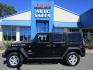 2011 BLACK /BLACK Jeep Wrangler Unlimited Rubicon 4WD (1J4BA6H18BL) with an 3.8L V6 OHV 12V engine, AUTOMATIC transmission, located at 1814 Albert Pike Road, Hot Springs, AR, 71913, (501) 623-1717, 34.494228, -93.094070 - Photo#0
