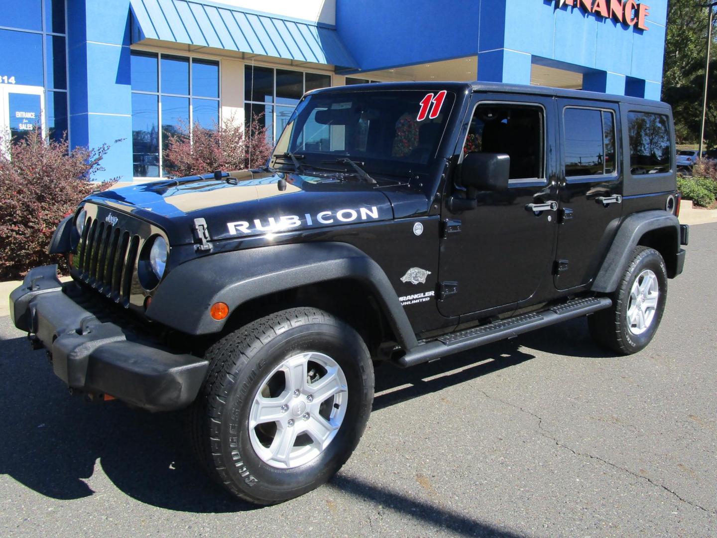 2011 BLACK /BLACK Jeep Wrangler Unlimited Rubicon 4WD (1J4BA6H18BL) with an 3.8L V6 OHV 12V engine, AUTOMATIC transmission, located at 1814 Albert Pike Road, Hot Springs, AR, 71913, (501) 623-1717, 34.494228, -93.094070 - Photo#1