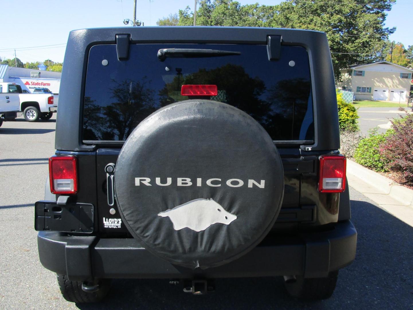 2011 BLACK /BLACK Jeep Wrangler Unlimited Rubicon 4WD (1J4BA6H18BL) with an 3.8L V6 OHV 12V engine, AUTOMATIC transmission, located at 1814 Albert Pike Road, Hot Springs, AR, 71913, (501) 623-1717, 34.494228, -93.094070 - Photo#5