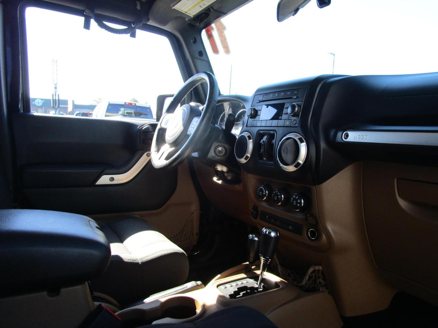 2011 BLACK /BLACK Jeep Wrangler Unlimited Rubicon 4WD (1J4BA6H18BL) with an 3.8L V6 OHV 12V engine, AUTOMATIC transmission, located at 1814 Albert Pike Road, Hot Springs, AR, 71913, (501) 623-1717, 34.494228, -93.094070 - Photo#9