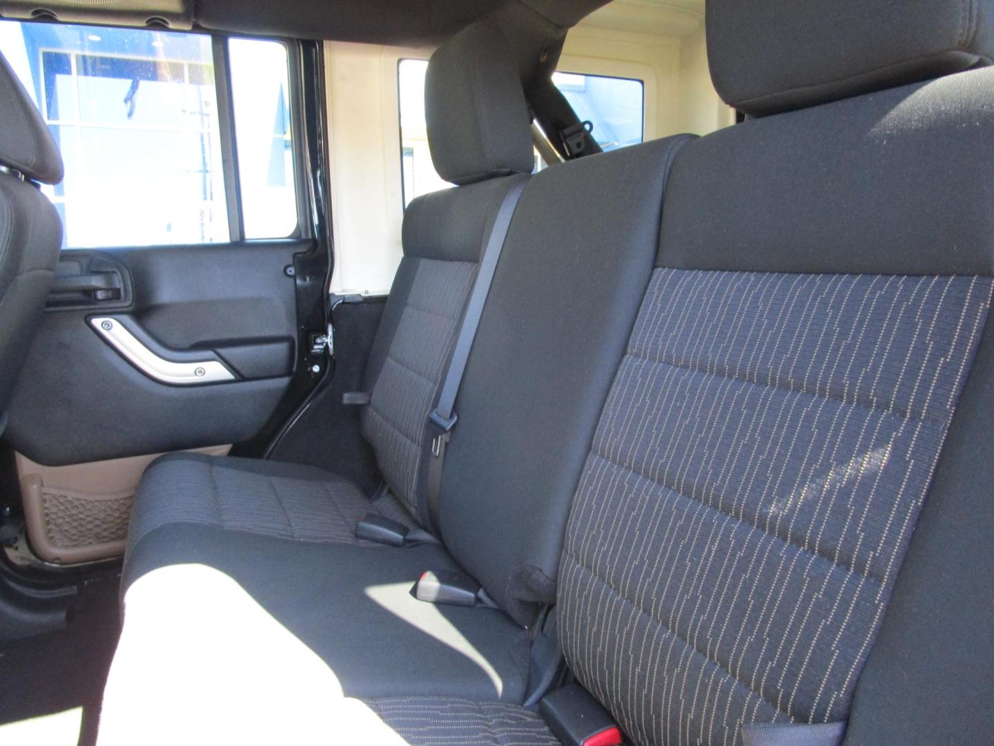 2011 BLACK /BLACK Jeep Wrangler Unlimited Rubicon 4WD (1J4BA6H18BL) with an 3.8L V6 OHV 12V engine, AUTOMATIC transmission, located at 1814 Albert Pike Road, Hot Springs, AR, 71913, (501) 623-1717, 34.494228, -93.094070 - Photo#7